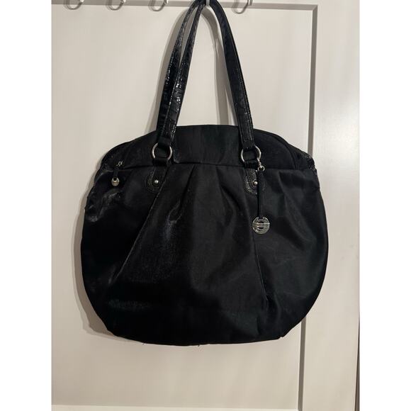 Travelon Black Tote Shoulder Bag Carry On Expandable Travel Turquoise Lining - Picture 1 of 14